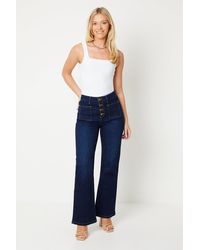 Dorothy Perkins - High Rise Button Detail Patch Pocket Flare Jeans - Lyst