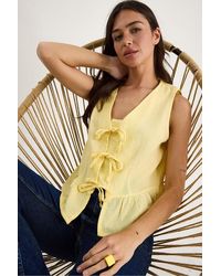 Bianco Lucci - V-Neck Crepe Blouse With Bow Tie - Lyst