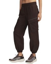Under Armour - Unstoppable Joggers (Donkerbruin) - Lyst