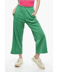 Palm Angels - Track Flared Pants Met Contrasterende Zijbanden In Groen - Lyst