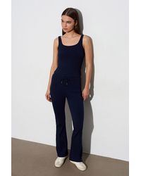 Dilvin - Mid-Waist Flare Jersey Pants With Drawstring - Lyst