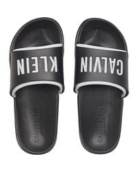 Calvin Klein Flip-flops and slides for Women - Up to 49% off at Lyst.com