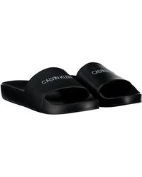 Calvin Klein Flat sandals for Women - Up to 60% off at Lyst.com