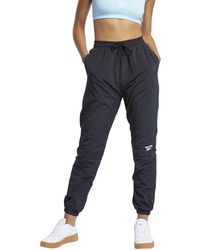 Reebok Straight-leg pants for Women - Up to 65% off at Lyst.com
