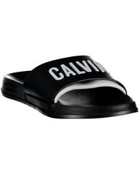 Calvin Klein Flip-flops and slides for Women - Up to 45% off at Lyst.com