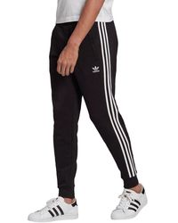 adidas originals adicolor beckenbauer joggers in skinny fit in black cw1269