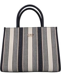 Guess - Bolsas. Azul - Lyst