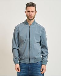 Guess - Blauwe Jassen - Lyst
