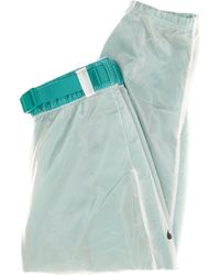 Nike - Trainingsbroek W Sportswear Tech Pack Broek Geweven Mesh Hoogbouw Neptune Groen/Wit/Zwart - Lyst
