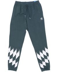 adidas - Joggingbroek Rekive Placed Graphic Joggingbroek Mintgroen - Lyst