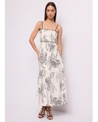 GAUDI - Vestido De Lino Con Estampado Floral Blanco-Negro Mujer - Lyst