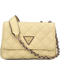 Guess - Bolsas. Amarillo - Lyst