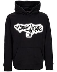 Tommy Hilfiger - Lichtgewicht Sweatshirt Met Capuchon Voor Relaxed Spray Graffiti Hoodie Zwart - Lyst