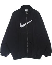 Nike - Essential gewebte jacke - schwarz/weiß - Lyst