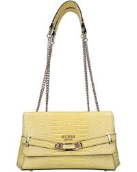 Guess - Bolsas. Amarillo - Lyst