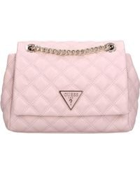 Guess - Bolsas. Rosa - Lyst