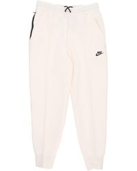 Nike - Lichtgewicht Trainingspakbroek Voor W Sportswear Tech Fleece Halfhoge Joggingbroek Bleek Ivoor/Zwart - Lyst