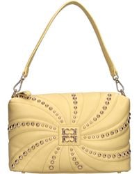 La Carrie - Bolsas. Amarillo - Lyst