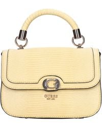Guess - Bolsas. Amarillo - Lyst