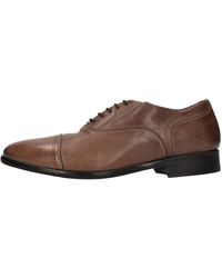 Sturlini - Lage Schoenen Bruin - Lyst