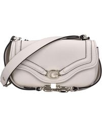 Guess - Bolsas. Crema - Lyst
