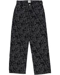 Arte' - Lange Lange Broek Mannen Allover Logo Pant Zwart - Lyst