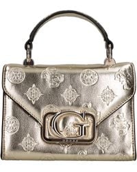 Guess - Bolsas. Oro - Lyst