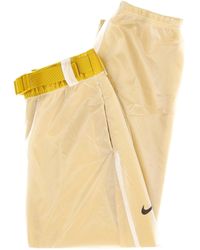 Nike - Trainingsbroek W Sportswear Tech Pack Pant Woven Mesh High-Rise Dark Citron/Wit/Zwart - Lyst