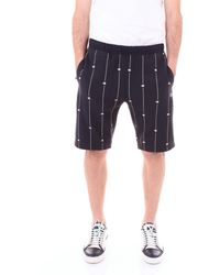 pantaloncini champion verdi