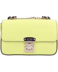 Guess - Bolsas. Amarillo - Lyst