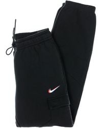 Nike - Pantalon De Survetement Polaire Femme W Sportswear Cargo Loose Pant Noir - Lyst