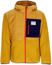 COTOPAXI - Chaqueta Hibrida Con Capucha Trico Para Hombre Ambar/Ambar - Lyst