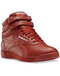 womens high top reebok shoes