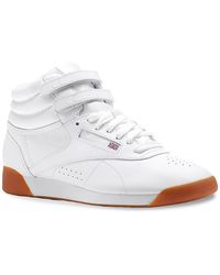 red reebok freestyle high top