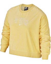 nike terry towelling shorts in yellow