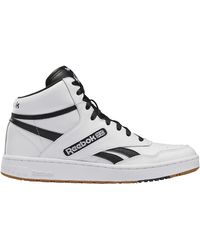 all white high top reeboks