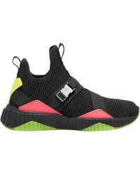 puma defy mid red