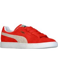 red puma sneakers