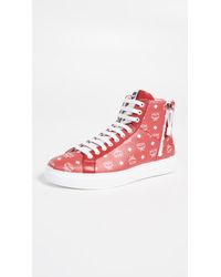 red mcm sneakers