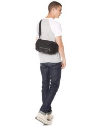 tumi martin sling