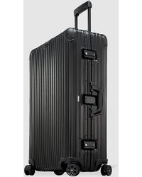 supreme rimowa topas multiwheel 82l red