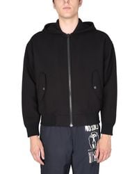 Moschino - Hooded Jacket With Bold Logo Print - Lyst