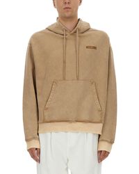 Moschino - Washed Hoodie With Logo And Studded Design - Lyst