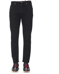 Versace - Slim Fit Jeans With Concealed Button Closure - Lyst
