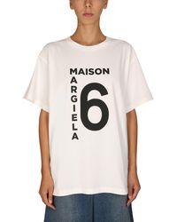 Donna T-shirt e top da T-shirt e top MM6 by Maison Martin Margiela T-SHIRT GIROCOLLO IN JERSEY DI COTONE CON PATCH LOGOMM6 by Maison Martin Margiela in Cotone di colore Nero 