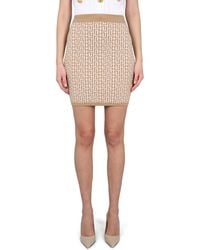 Balmain - Fitted Mini Skirt With All-Over Pattern - Lyst