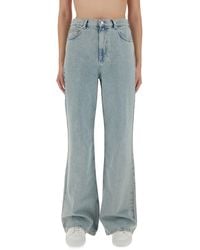 Moschino - Wide-Leg Light Denim Jeans - Lyst