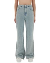 Moschino - Wide-Leg Light Denim Jeans - Lyst