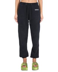 Versace - Jogging Pants With Logo - Lyst