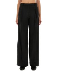 THE GARMENT - Pants "Pluto" - Lyst